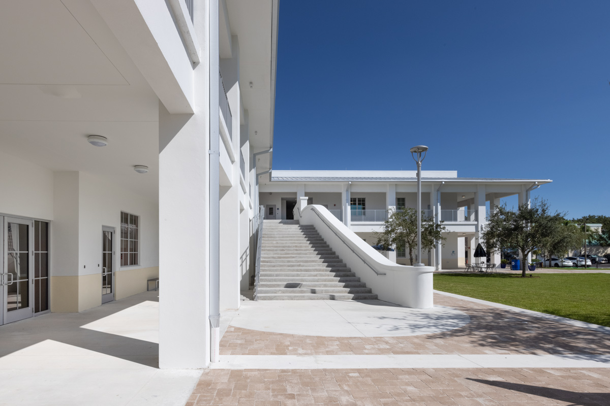 Architectural dusk photo of outdoor stairs at Palmer Trinity student center in Miami, FL